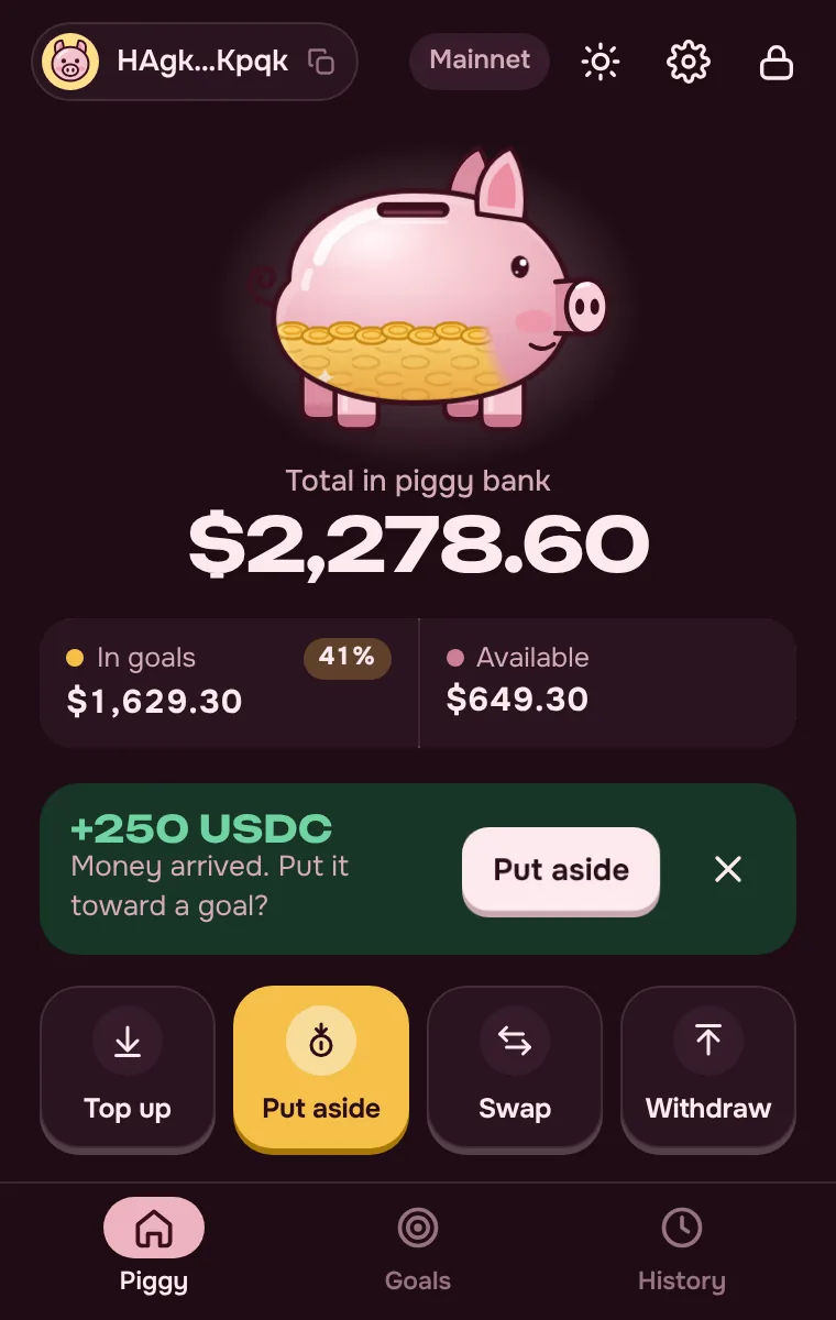 Pantalla principal de PiggyBank: saldo, metas y billetera