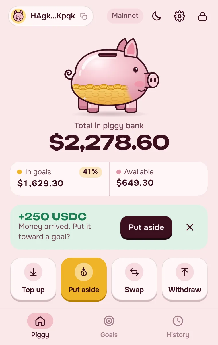 Pantalla principal de PiggyBank: saldo, metas y billetera